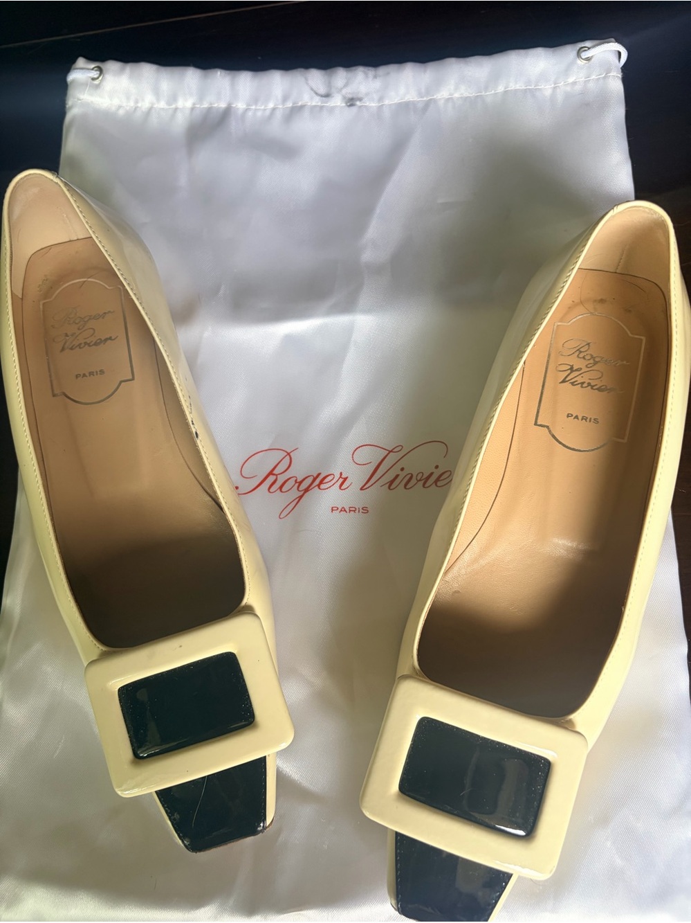 Roger Vivier Cream Patent Pumps with Black Buckle and Toe